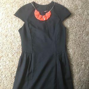 Great black dress with a surprise back detail! NWT
